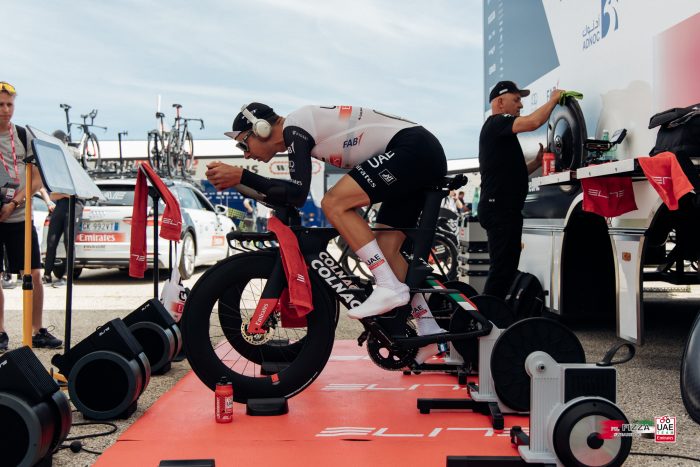 A cyclist on a training bike.