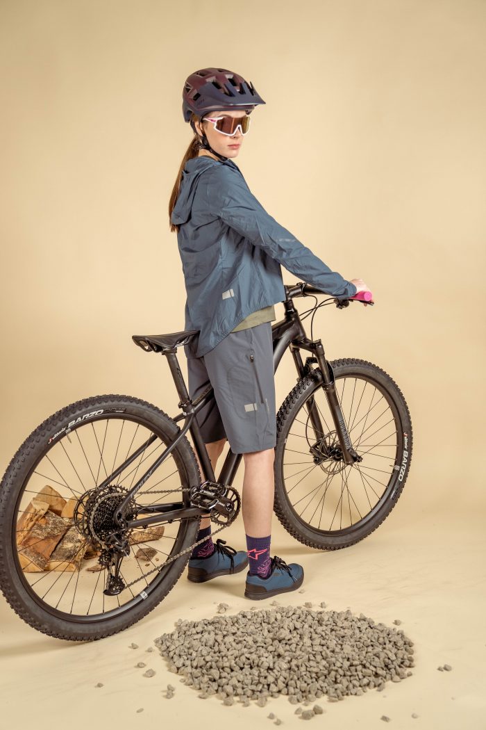 A mountain biker showing off the relevant clothing.