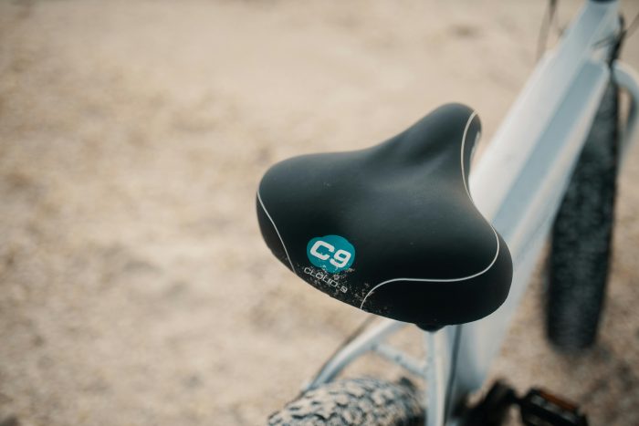 A black bicycle saddle and seat.